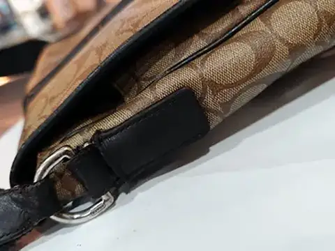 The same bag with the leather tab remade and the D-ring fitted