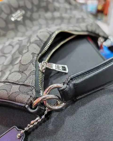 The same bag with the strap tab reattached to the ring